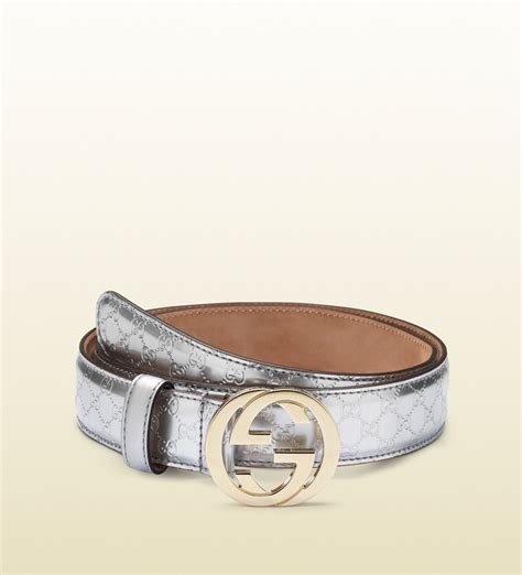 silver Gucci belt buckle